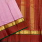 Pallu detail of mauve pink and deep maroon Kanjivaram Korvai saree with Kaal Irangiya antique gold zari