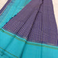 Sky blue border detail with green silk stripe lines on handwoven navy blue and white Kanchi Kattam Kanchi Pattu saree