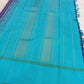 Green silk stripe line detail on sky blue border of navy blue and white Kanchi Kattam handwoven pure silk Kanchi Pattu saree