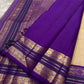 Wisteria purple Varisaipet border of the KanchiPattu saree with circular Kamalam medallion motifs and geometric bands in gold zari