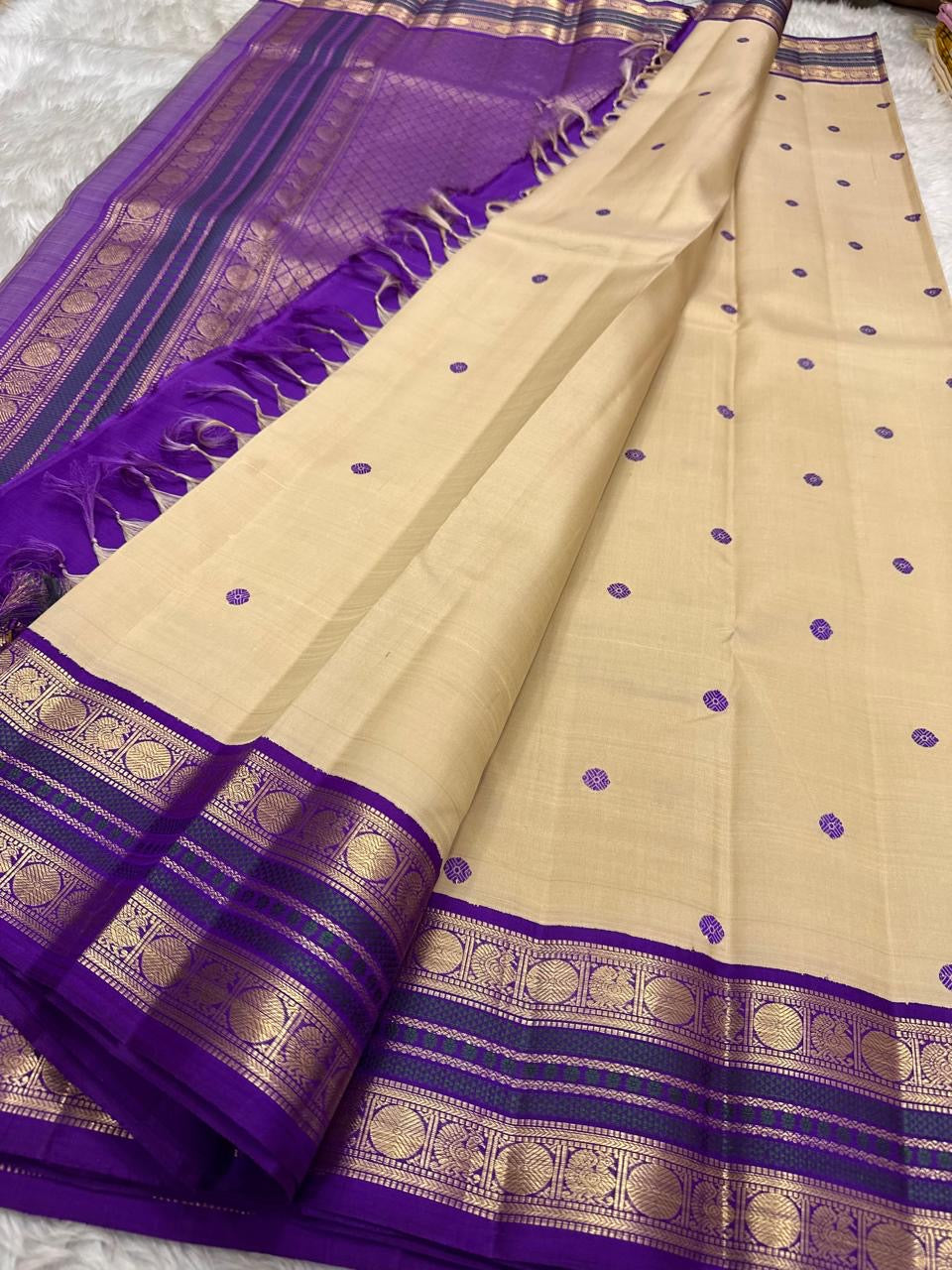 Pallu of the KanchiPattu saree in wisteria purple with Varisaipet gold zari banding