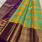 Handwoven KanchiPattu Bomkai Butta saree in turquoise and saffron figural panels with deep purple gold zari border, full folded view