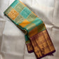Close-up of turquoise silk Bomkai panel with elephant and animal figurals in antique gold and silver zari — KanchiPattu