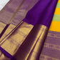 Full drape view of KanchiPattu Bomkai Butta saree with turquoise-saffron body and purple antique gold border