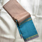 Close-up of warm taupe pure silk body on handwoven KanchiPattu saree — blush-beige plain weave with refined lustre