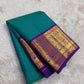 Close-up of teal Zari Kattam silk body showing fine intersecting gold zari grid on pure silk KanchiPattu saree