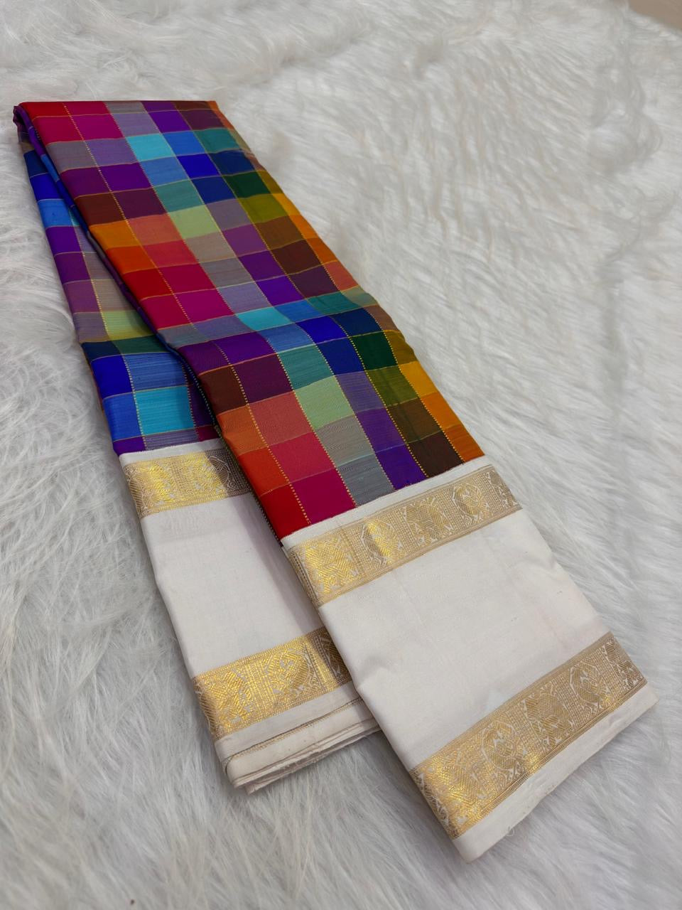 Handwoven Kanchipuram Paalum Pazhamum saree in oversized multicolour silk checks with navy Rettapet gold zari border, full folded view