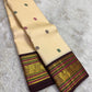 Arakku red Varisaipet border of the Kanchipuram saree with Yaanai elephant procession in gold zari and layered geometric bands