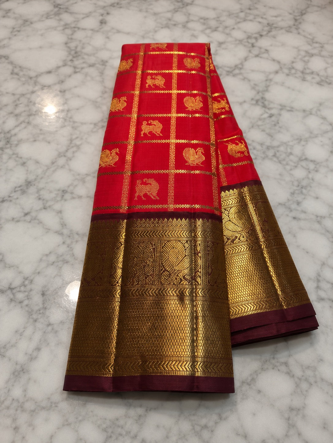 Handwoven pure silk Kanchipuram saree in scarlet red with Zari Kattam body, Vanasringaram Butta in 3 gram gold zari, and dark maroon Vanasringaram border — Idam Living