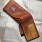 Close-up of shot copper-to-plum silk body with Zari Kattam gold grid and silver Gandaberunda Butta — Kanjipuram Veldhari