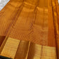 Handwoven Kanjipuram Veldhari saree in shot copper-plum with Zari Kattam grid, Gandaberunda Butta, and deep green antique gold border, full folded view