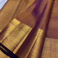 Deep green border with stacked heavy antique gold zari bands — Kanjipuram Veldhari Gandaberunda saree detail