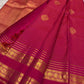 Self-colour arakku red Varisaipet border detail with layered woven lines and antique gold zari Yaanai and Kamalam motifs on handwoven Kanchipuram saree