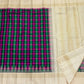 Multicolour Kanchi Kattam Kanchipuram silk saree with ivory Thazhampoo Reku border — folded view