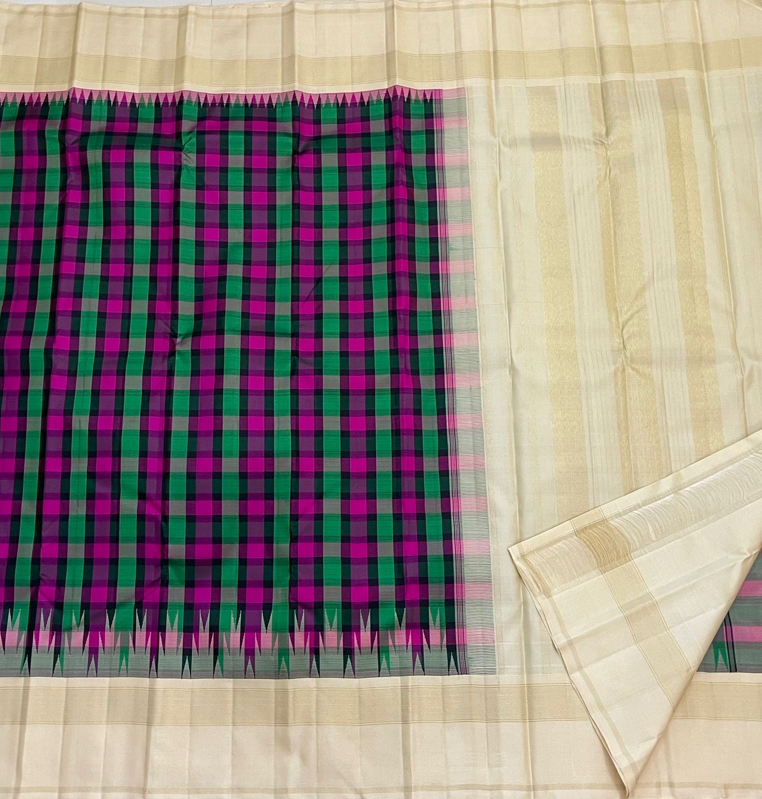 Multicolour Kanchi Kattam Kanchipuram silk saree with ivory Thazhampoo Reku border — folded view
