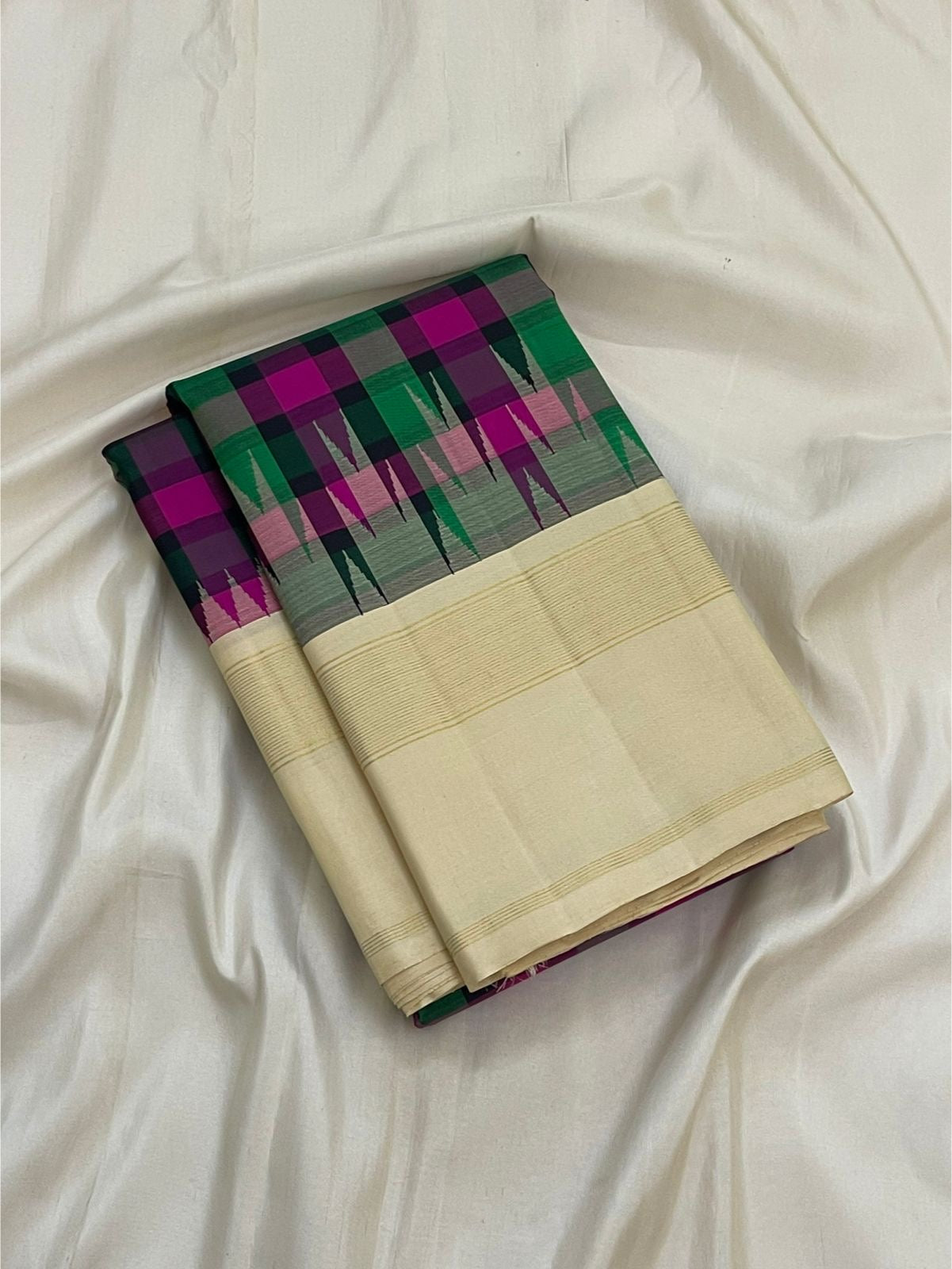 Multicolour Kanchi Kattam handwoven pure silk Kanchipuram saree with ivory Thazhampoo Reku border — full folded overview