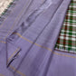 Lavender border detail with slender gold zari lines on handwoven multicolour Paalum Pazhamum Kanchipuram saree
