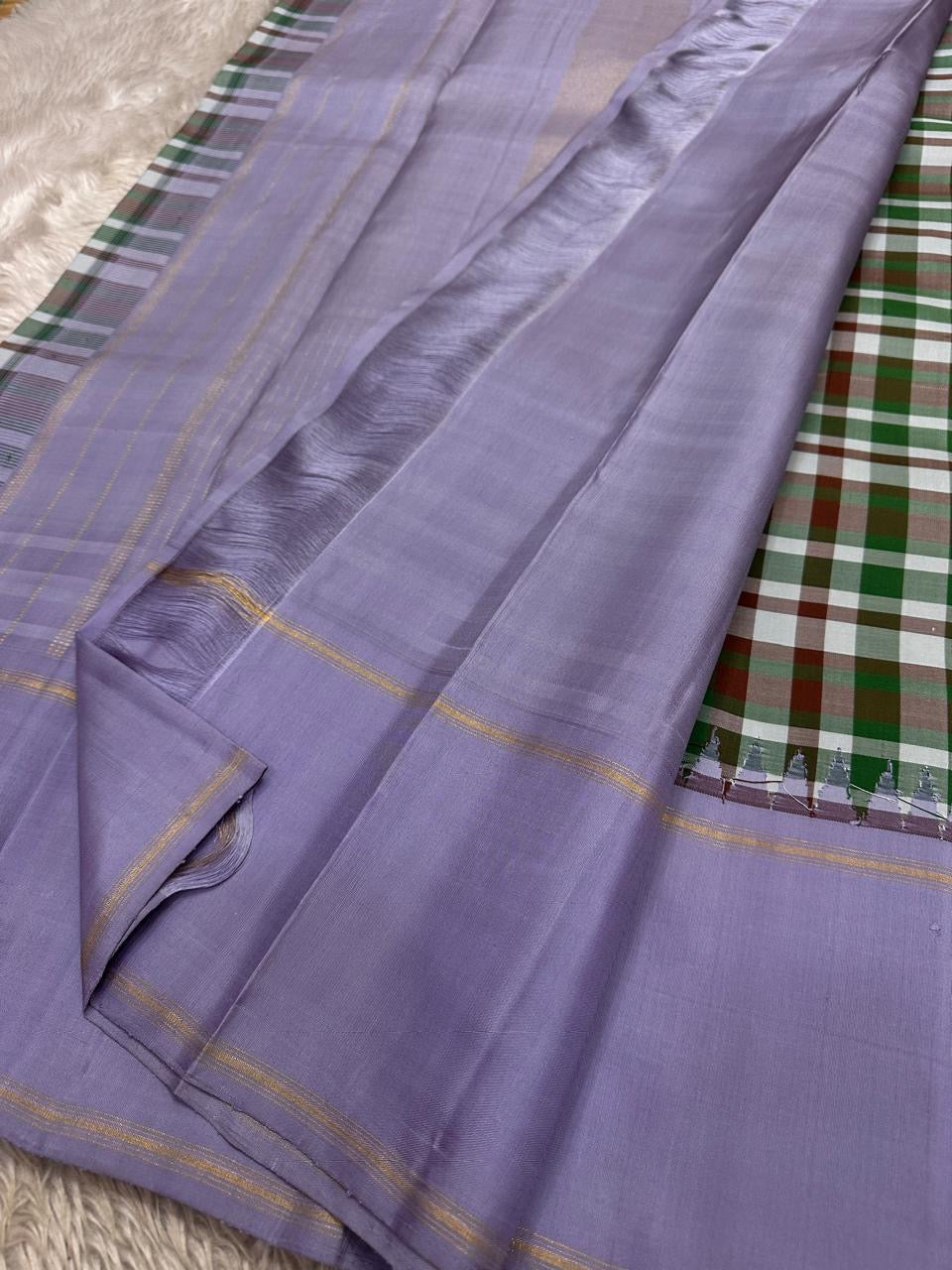 Lavender border detail with slender gold zari lines on handwoven multicolour Paalum Pazhamum Kanchipuram saree