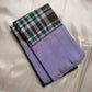 Close-up of Paalum Pazhamum silk check body showing multiple coloured silk threads intersecting in green arakku red white and olive on pure silk Kanchipuram saree