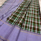 Pallu detail of multicolour Paalum Pazhamum pure silk Kanchipuram saree showing lavender ground with gold zari lines