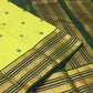 Handwoven Kanjeevaram Varisaipet saree in lime green with deep green Silk Thread Butta and dark green maroon multi-band gold zari border, full folded view