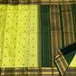Deep green Silk Thread Kamalam circular butta on lime green silk — Kanjeevaram Varisaipet body close-up