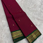Handwoven pure silk Kanchipuram lightweight saree in deep maroon and teal, Korvai construction with Floral Butta body and Vanasringaram border — Idam Living