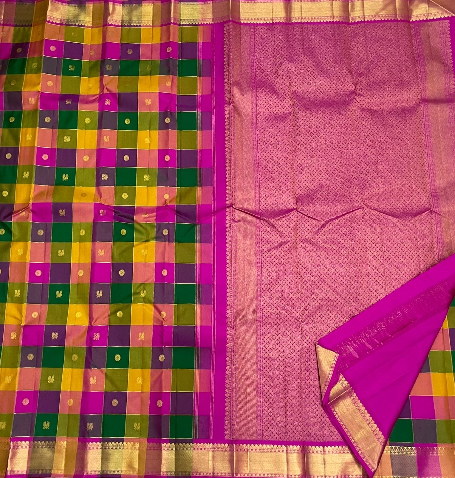 Multicolour Paalum Pazhamum KanchiPattu silk saree folded with magenta Korvai Kamalam border visible