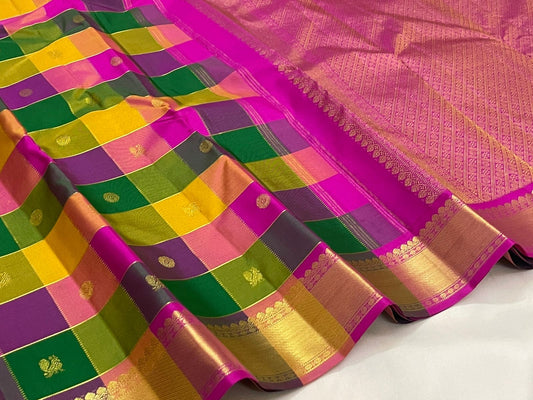 Magenta pallu of multicolour Paalum Pazhamum Korvai KanchiPattu saree with Kamalam butta — pallu close-up