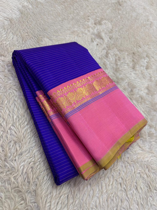 Deep violet Korvai Kaal Irangiya border detail with antique gold zari geometric motifs on handwoven Kanjeevaram saree