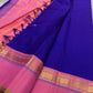 Pallu detail of royal blue and radiant pink pure silk Kanjeevaram saree showing antique gold zari geometric motifs in Kaal Irangiya border