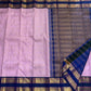 Deep navy Rettapet border with grand Mayil Butta peacock figurals in antique gold zari — Kanjipuram saree detail