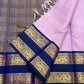 Antique gold Mayil Butta peacock and floral scroll pallu on deep navy Rettapet — Kanjipuram Butta lavender saree
