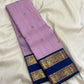 Full folded view of lavender Kanjipuram Butta saree showing Meenakari body and deep navy border contrast