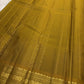 Close view of the arakku red silk body showing Nakshatra Butta star motifs scattered in gold zari across the full length