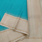 Handwoven pure silk Kanjipuram saree in peacock blue with Kanchi Kattam checkered grid body and Pillayar Reku ivory border in pale gold zari — Idam Living