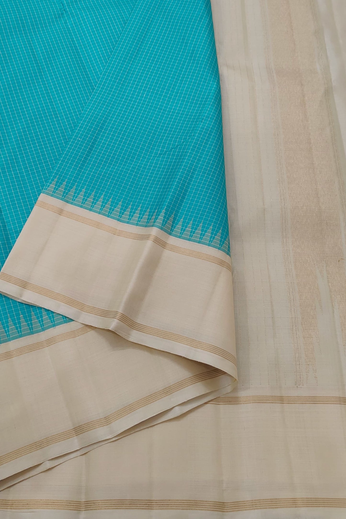 Handwoven pure silk Kanjipuram saree in peacock blue with Kanchi Kattam checkered grid body and Pillayar Reku ivory border in pale gold zari — Idam Living