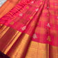 Handwoven KanchiPattu Veldhari saree in shot coral-magenta with Zari Kattam grid, Maanga Butta, and deep maroon antique gold pallu, full folded view