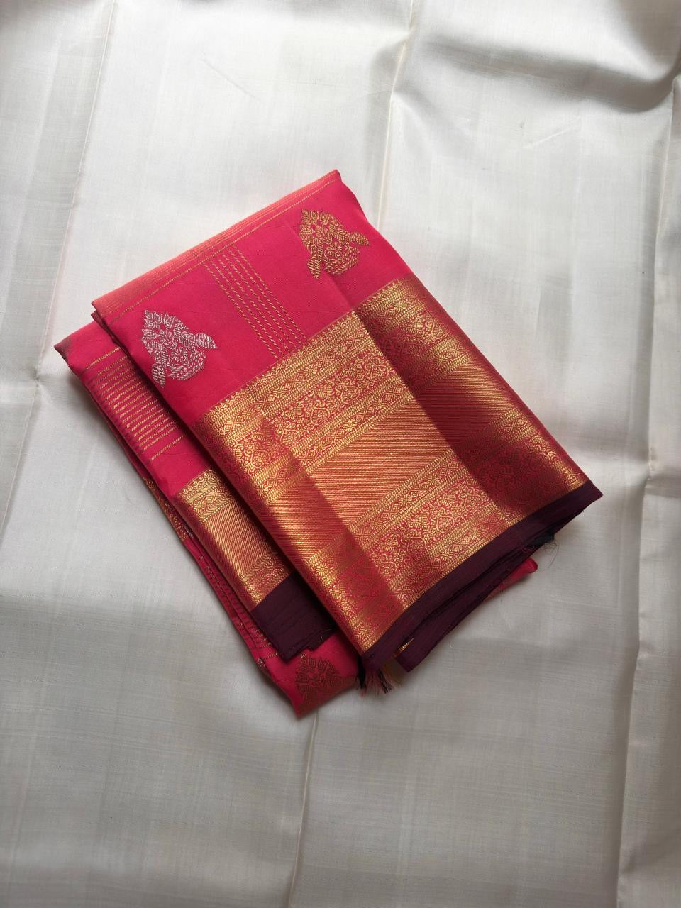 Heavy antique gold zari pallu with dense scroll figurals on deep maroon — KanchiPattu Veldhari saree
