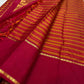 Orange and arakku red handwoven pure silk Kanjipuram saree with Korvai Vazhaipu Veldhari stripe body — full folded overview