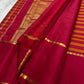 Arakku red Korvai border detail with narrow antique gold zari geometric band on handwoven Vazhaipu Veldhari Kanjipuram saree