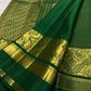 Handwoven Kanjivaram Zari Kattam saree in self-colour forest green with Floral Butta and grand Mayil Butta peacock gold pallu, full folded view