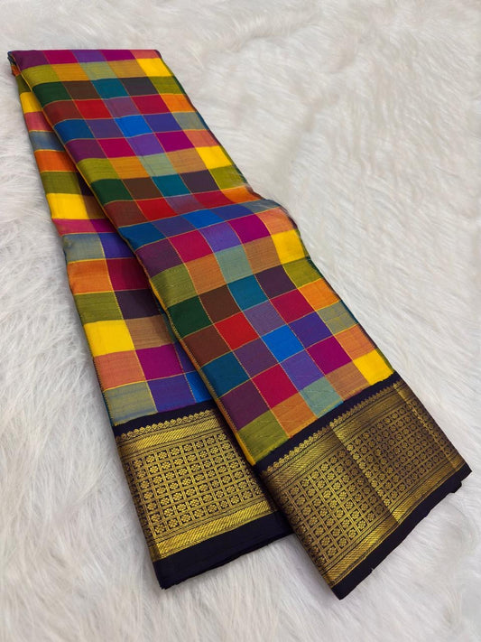 Handwoven Kanjivaram Paalum Pazhamum saree in multicolour silk checks with deep navy Rettapet gold zari border, full folded view