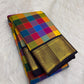 Close-up of multicolour Paalum Pazhamum silk check body — blue, purple, red, orange, magenta woven squares