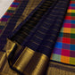 Gold zari pallu with peacock figural motifs on deep navy ground — Kanjivaram Paalum Pazhamum saree