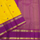 Silk thread butta detail on canary yellow handwoven pure silk Kancheepuram Rettapet saree — zari close-up