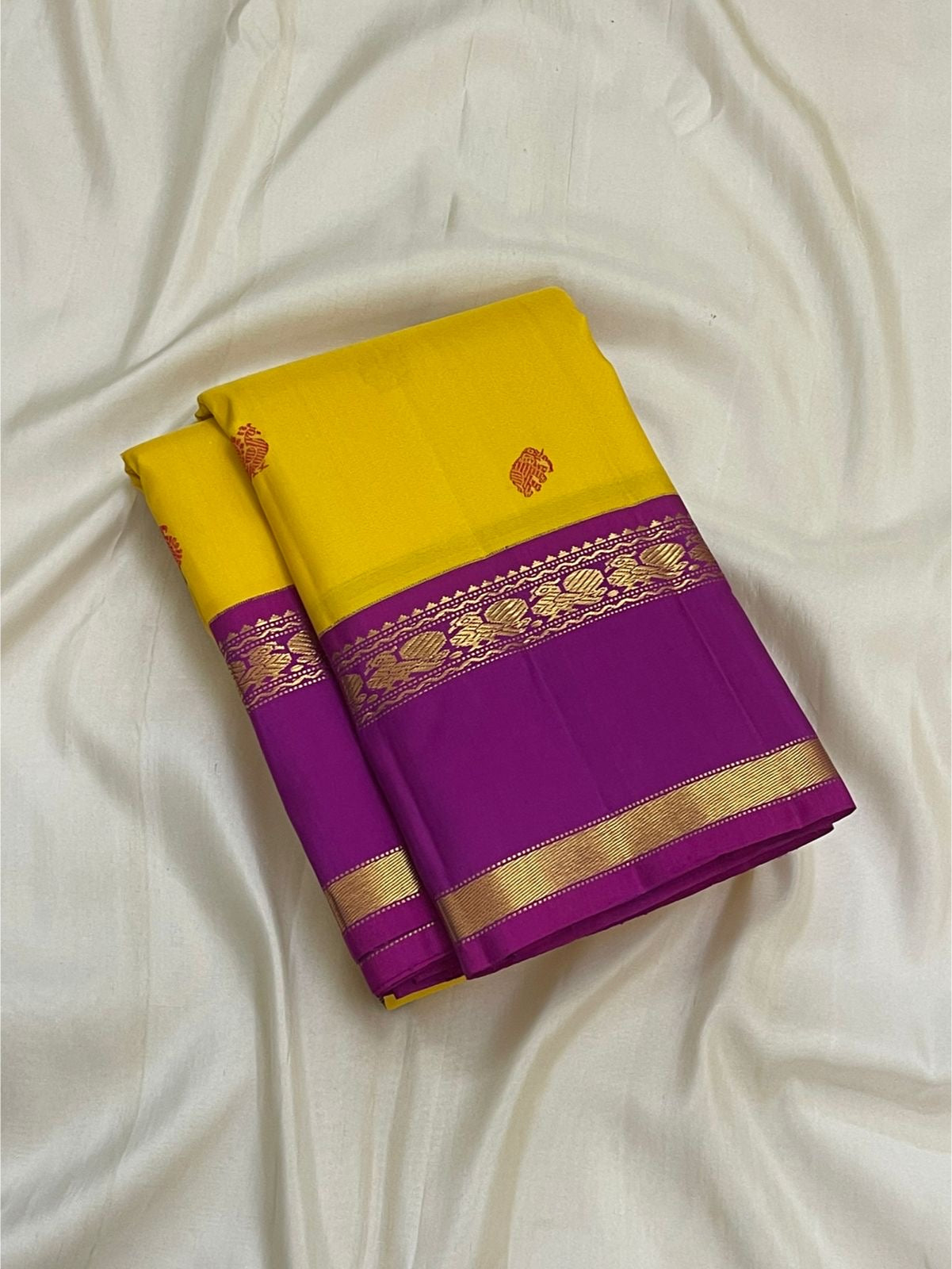 Canary yellow and violet handwoven pure silk Kancheepuram Rettapet saree with silk thread buttas — full folded overview