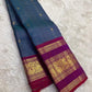 Teal and arakku red handwoven pure silk Kanjivaram saree with Zari Kattam body and Rettapet elephant border — full folded overview