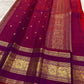 Arakku red Rettapet border detail with twin parallel woven lines and antique gold zari elephant and bird motifs on handwoven Kanjivaram saree