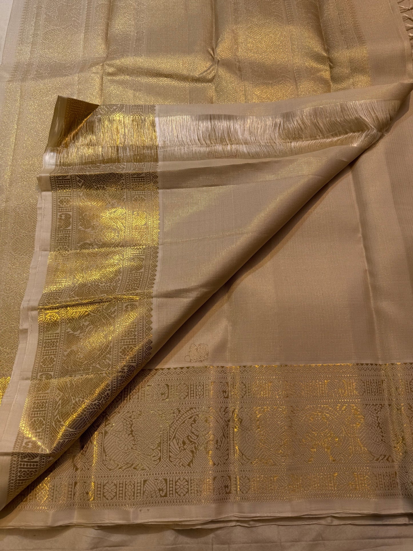 Luminous Ivory-Gold Pure Silk KanchiPattu Zari Kattam Saree - draped hero view